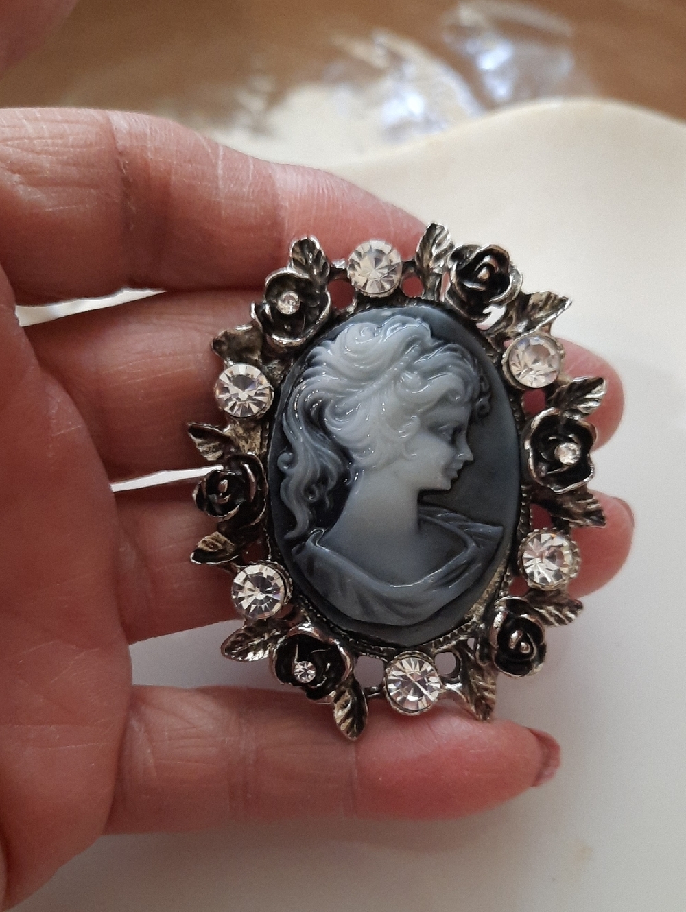 Vintage-Style Grey Cameo Brooch with Crystal Accents